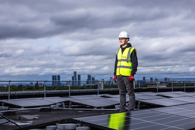 solar panels
solar energy
rooftop energy efficient 
man